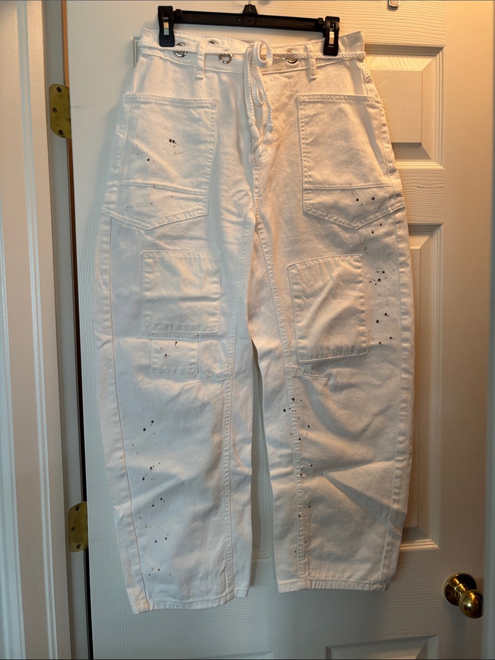 NWOT White Barrel Jeans with intentional paint splatter. Size M 15" waist